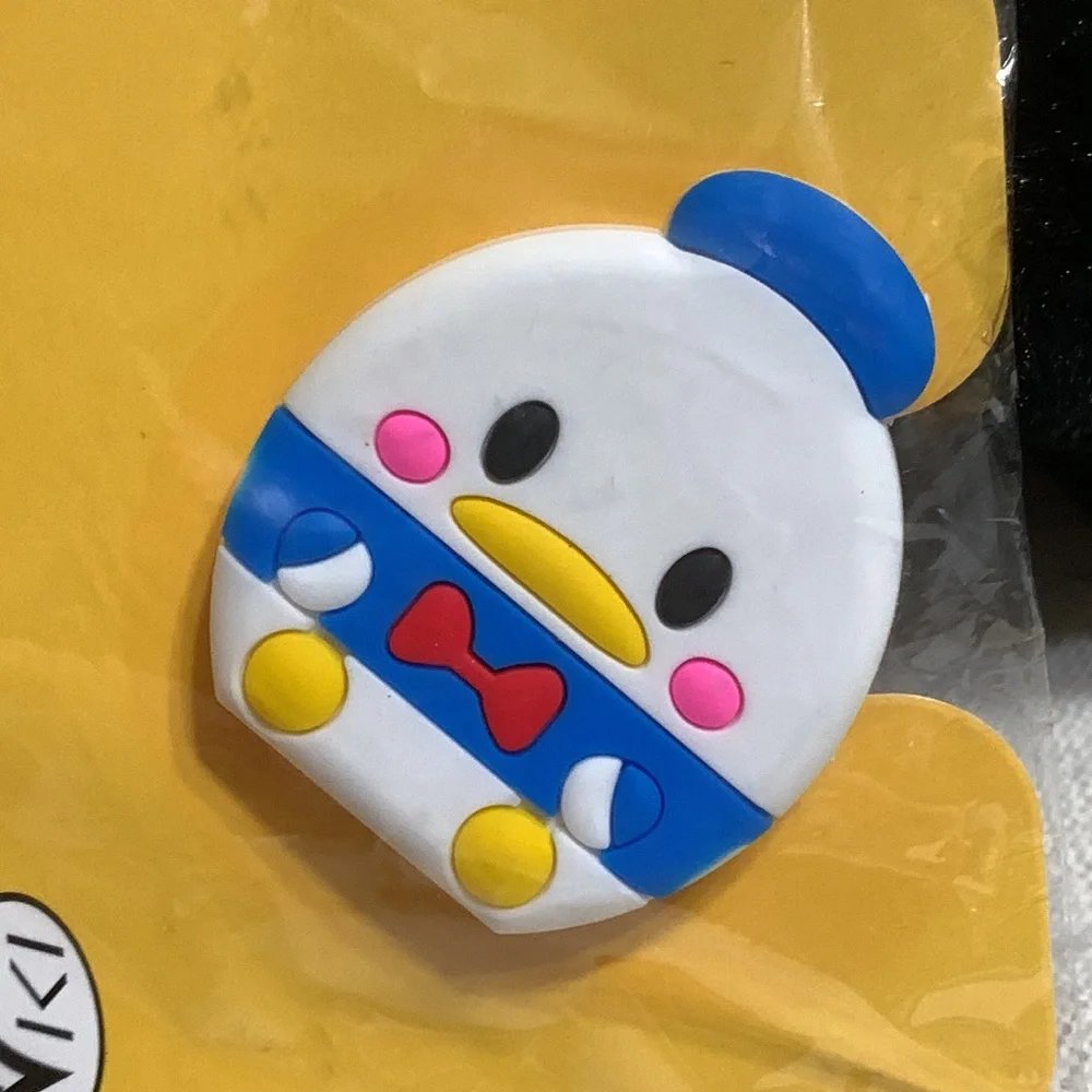 Baby Donald Duck Cell Phone Bracket. New in Packaging